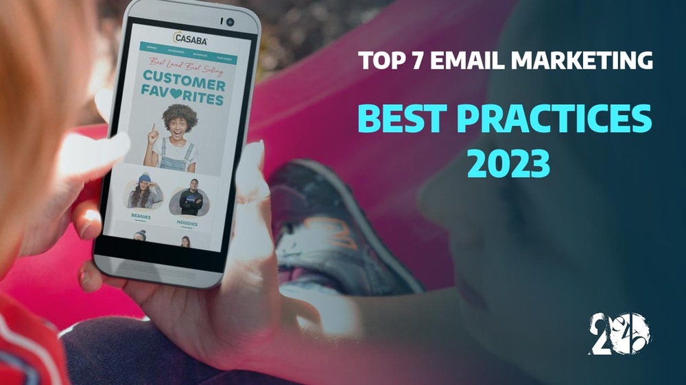 Two people looking at a cell phone with a marketing email with the words Top 7 Email Marketing Best Practices 2023